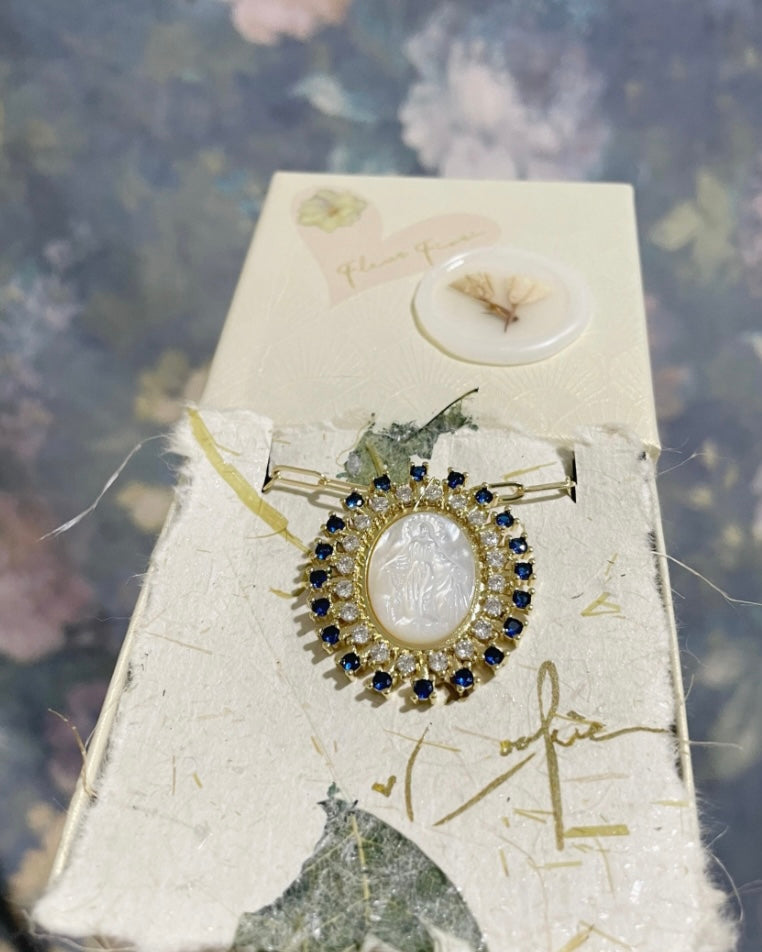 vintage milky medallion · sapphire