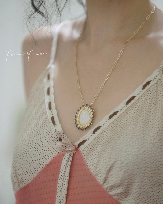 vintage milky medallion · sapphire