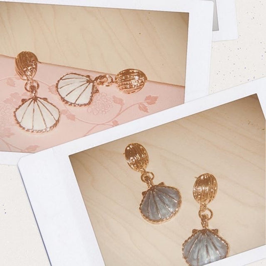 the mermaid shell dangles