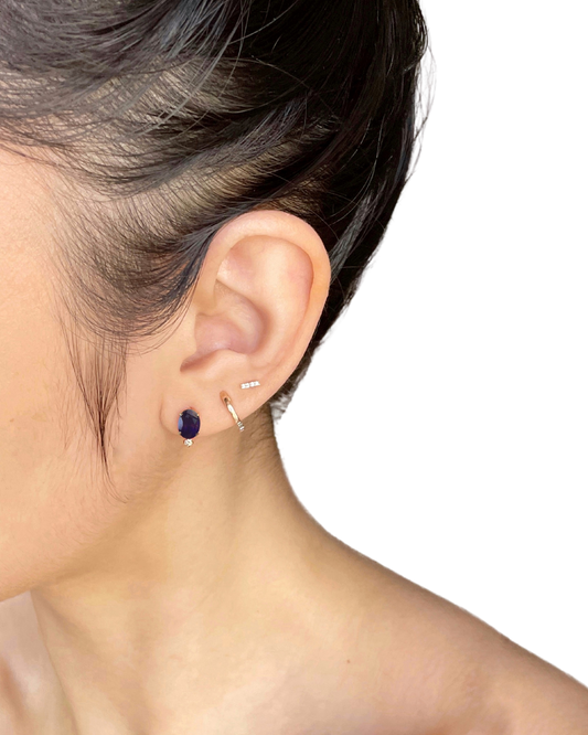 18K orbit studs · sapphire